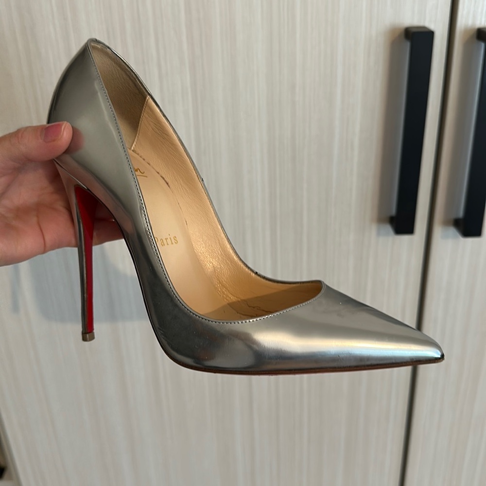 Christian Louboutin Silver Heels with Red Sole